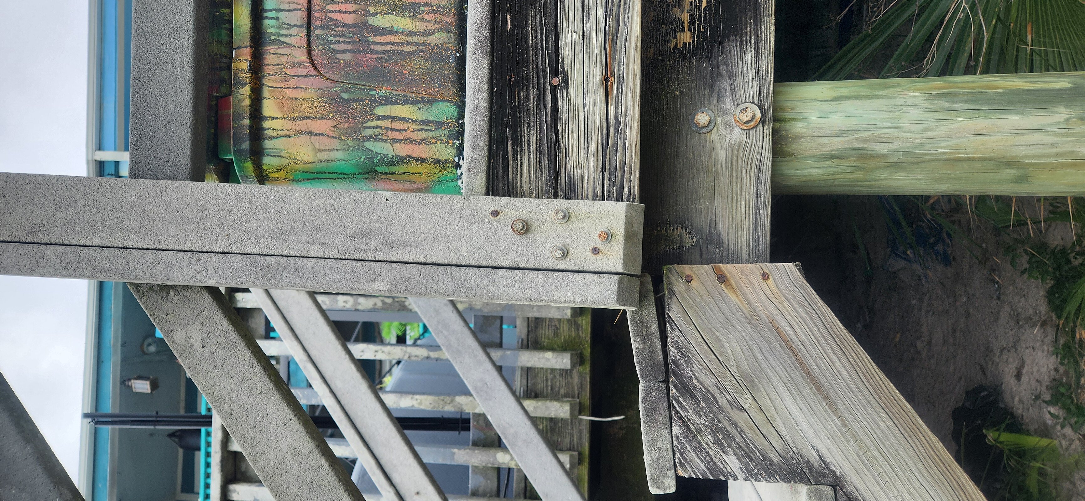 Securing wooden treads and risers for outdoor beach walkway repair